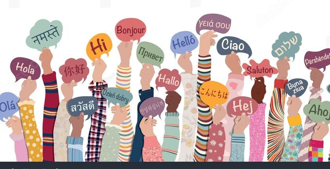 stock-vector-many-hands-raised-of-diverse-and-multicultural-children-and-teens-holding-speech-bubbles-with-text-2219221557.jpg
